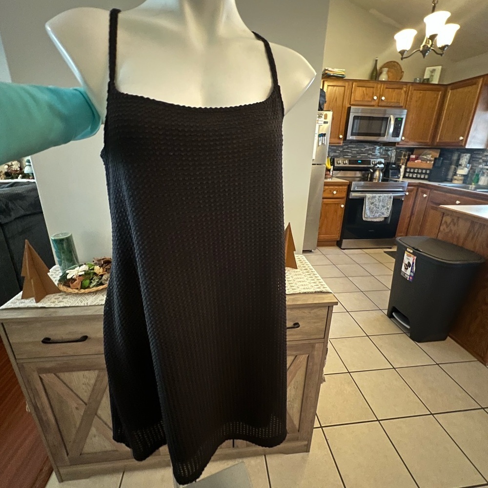 Divided women’s strappy little black dress